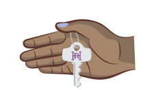 A hand holding a key with the letter r on it.